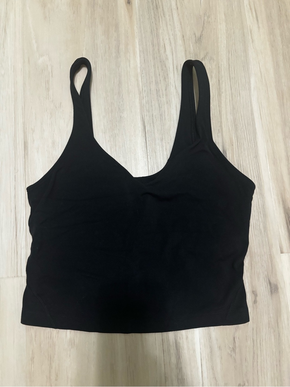 Lululemon black align cropped tank size 4. *There are NO bra pads*